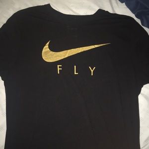 Men’s Large black with gold Nike check.